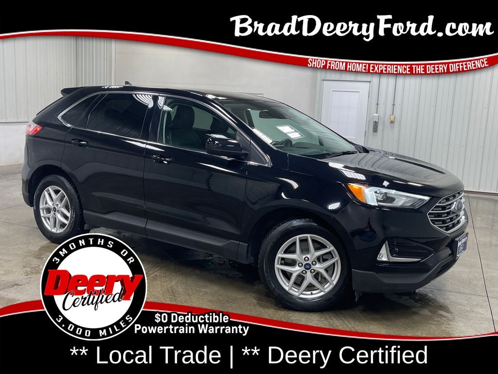 2021 Ford Edge SEL in Agate Black Metallic — front three-quarter view
