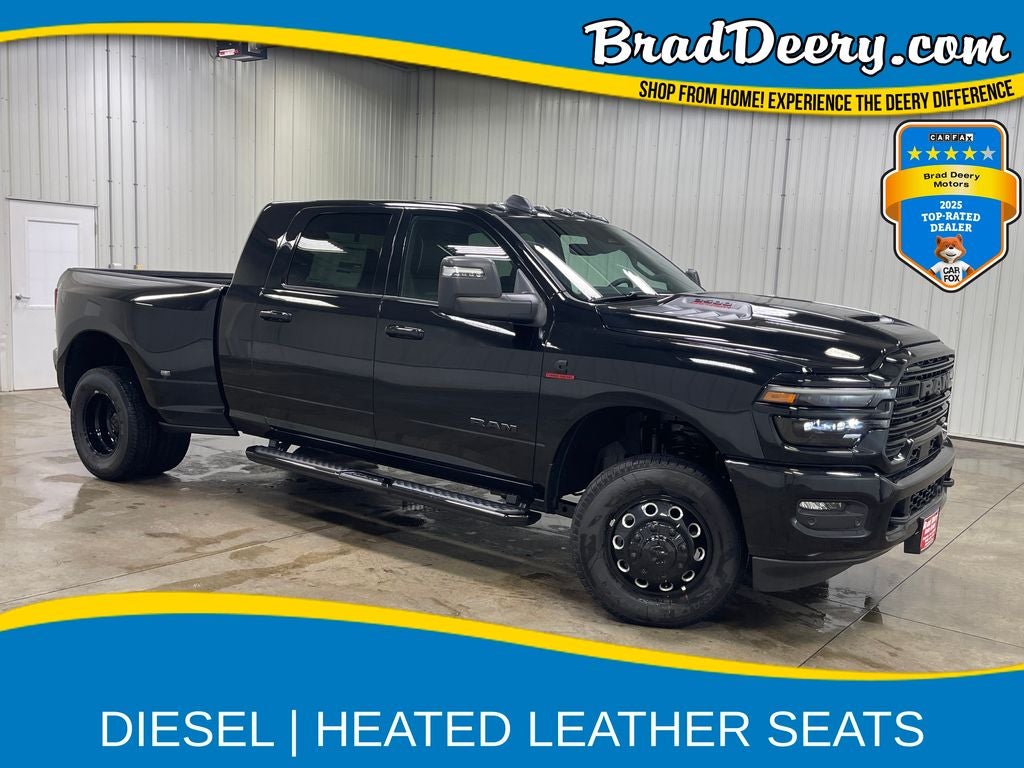 2026 RAM 3500 Laramie in Diamond Black Crystal Pearlcoat — front three-quarter view