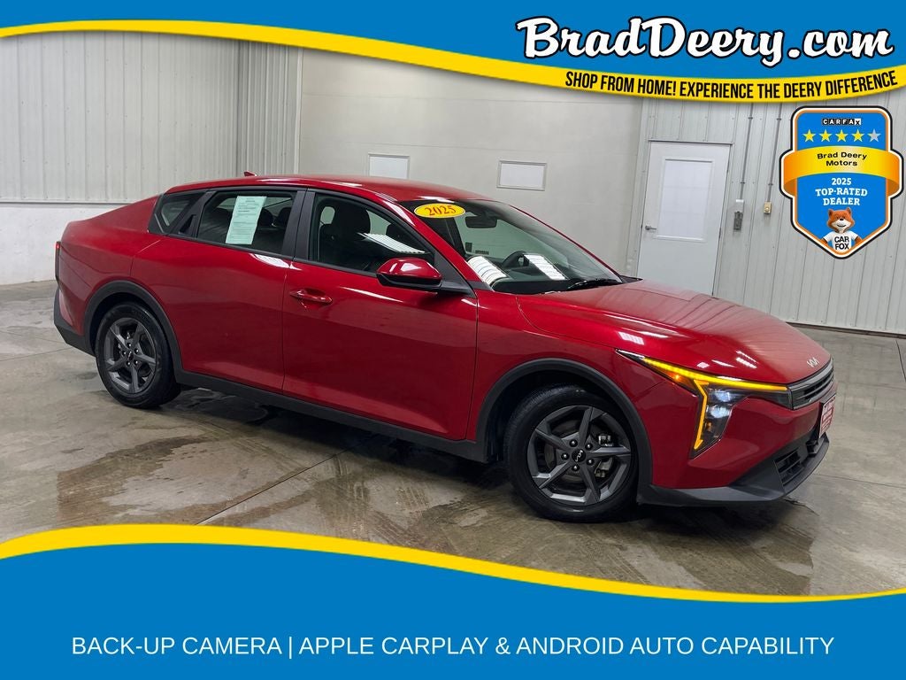 2025 Kia K4 LXS in Currant Red — front three-quarter view