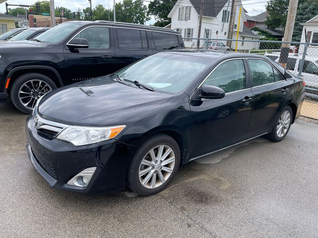 2012 Toyota Camry — rear three-quarter view