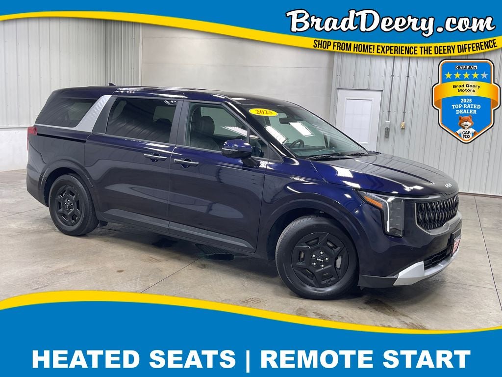 2025 Kia Carnival LXS in Deep Chroma Blue — front three-quarter view